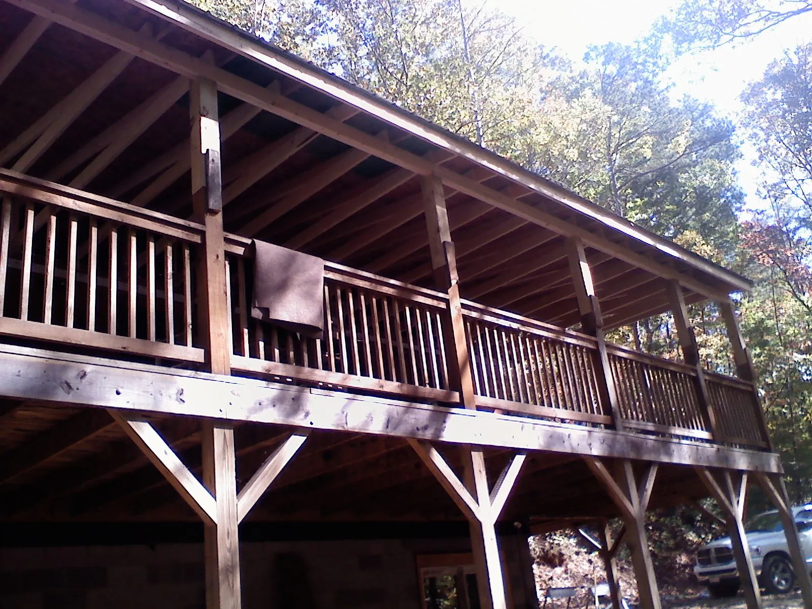 Timber framing under a new elevated porch and deck — Roof Leak Repair in West Islip by Roofing Brothers